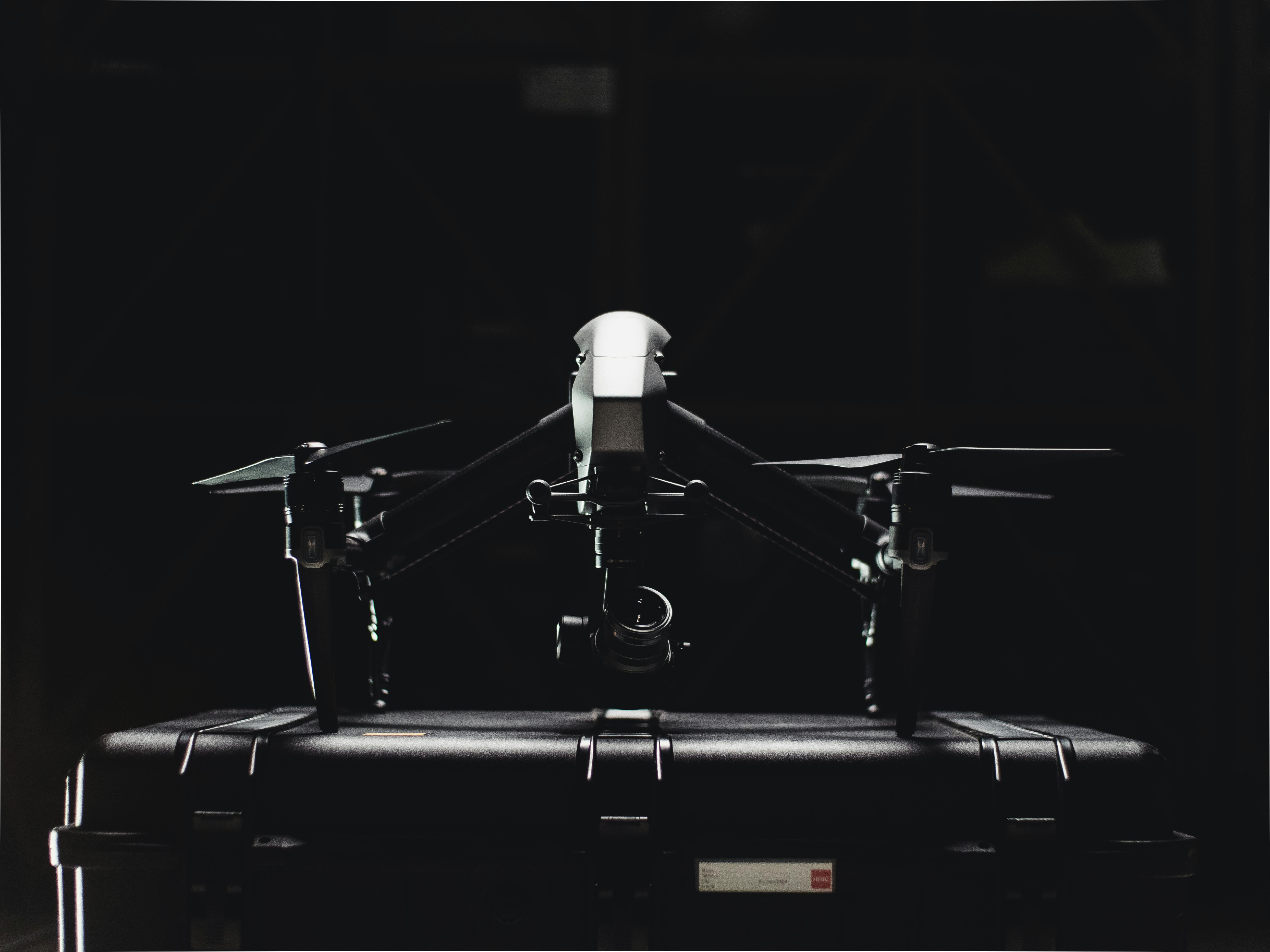 Drone in flight over terrain